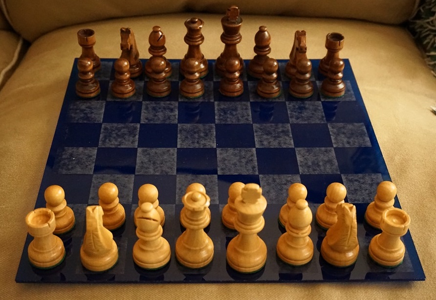 Laser-engraved chess board with pieces