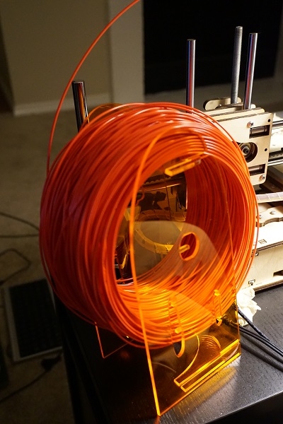 The laser-cut filament holder.